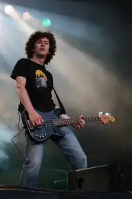 11057