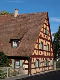 115047
