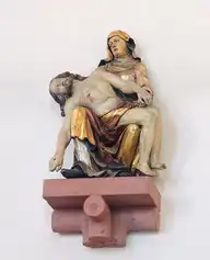 115634