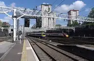 120572