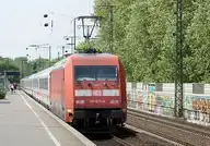 12854