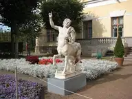 12872