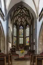 129047