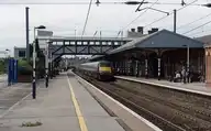 137211