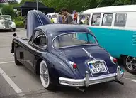 157028