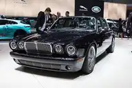 157037