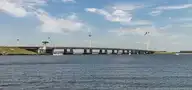 163055
