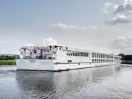 163209