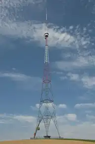 163230