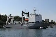 163557