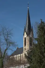 164028