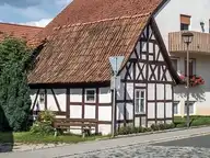 166445