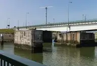 168057