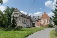 19577