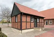 212410