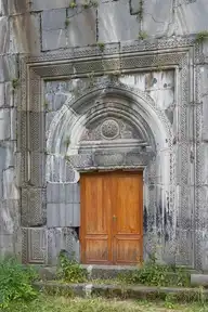 23002