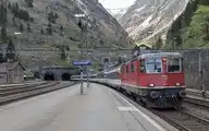 246125