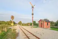 251035