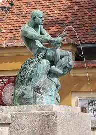 289210