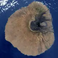 7775
